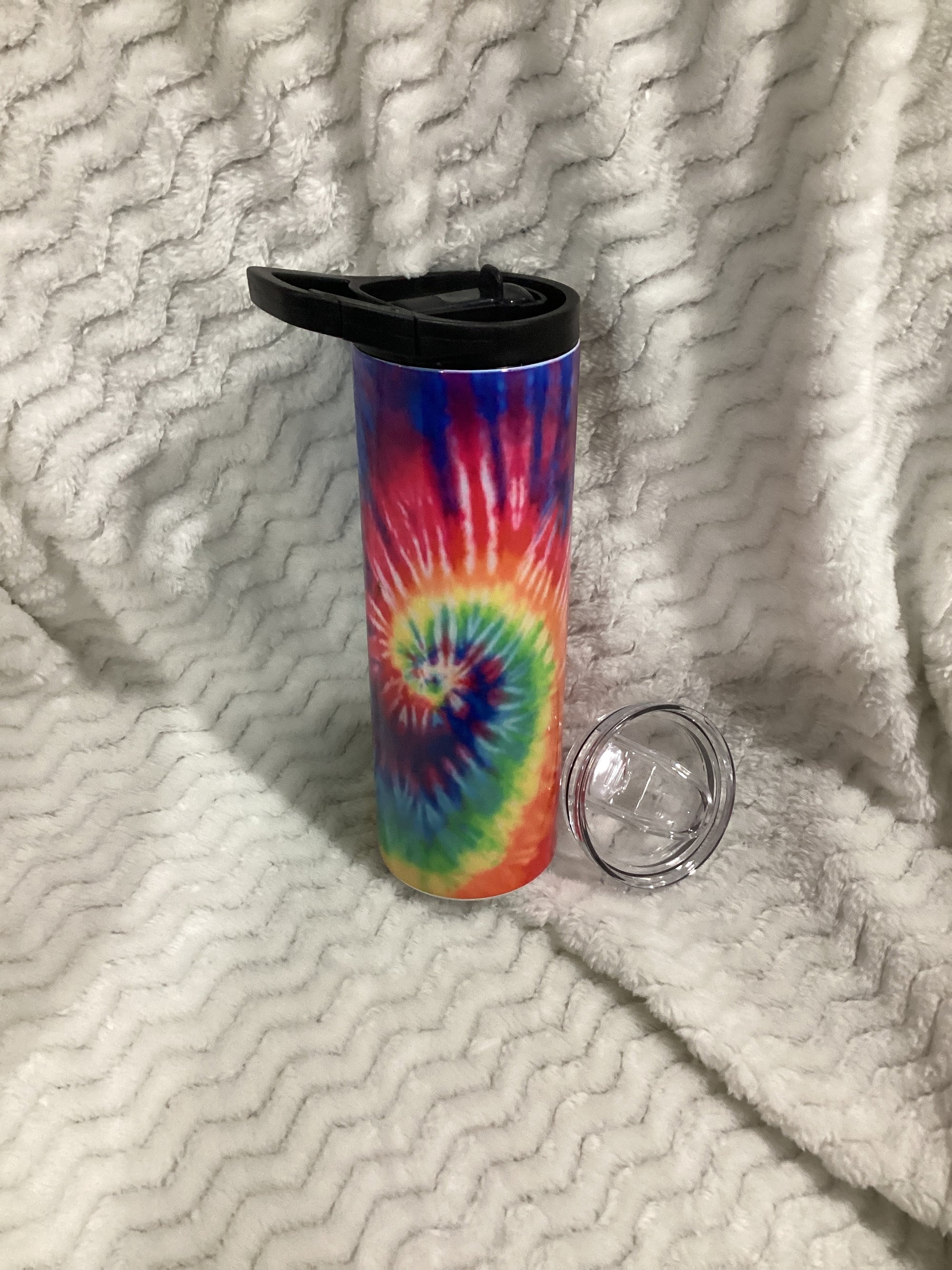 Tye dye water bottle with extra lid