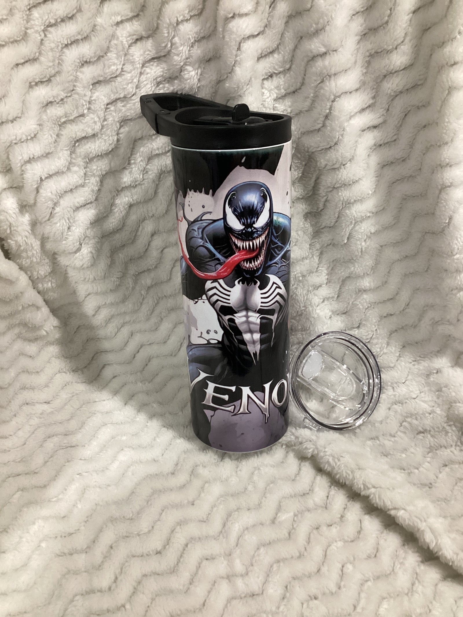 Venom water bottle with extra lid