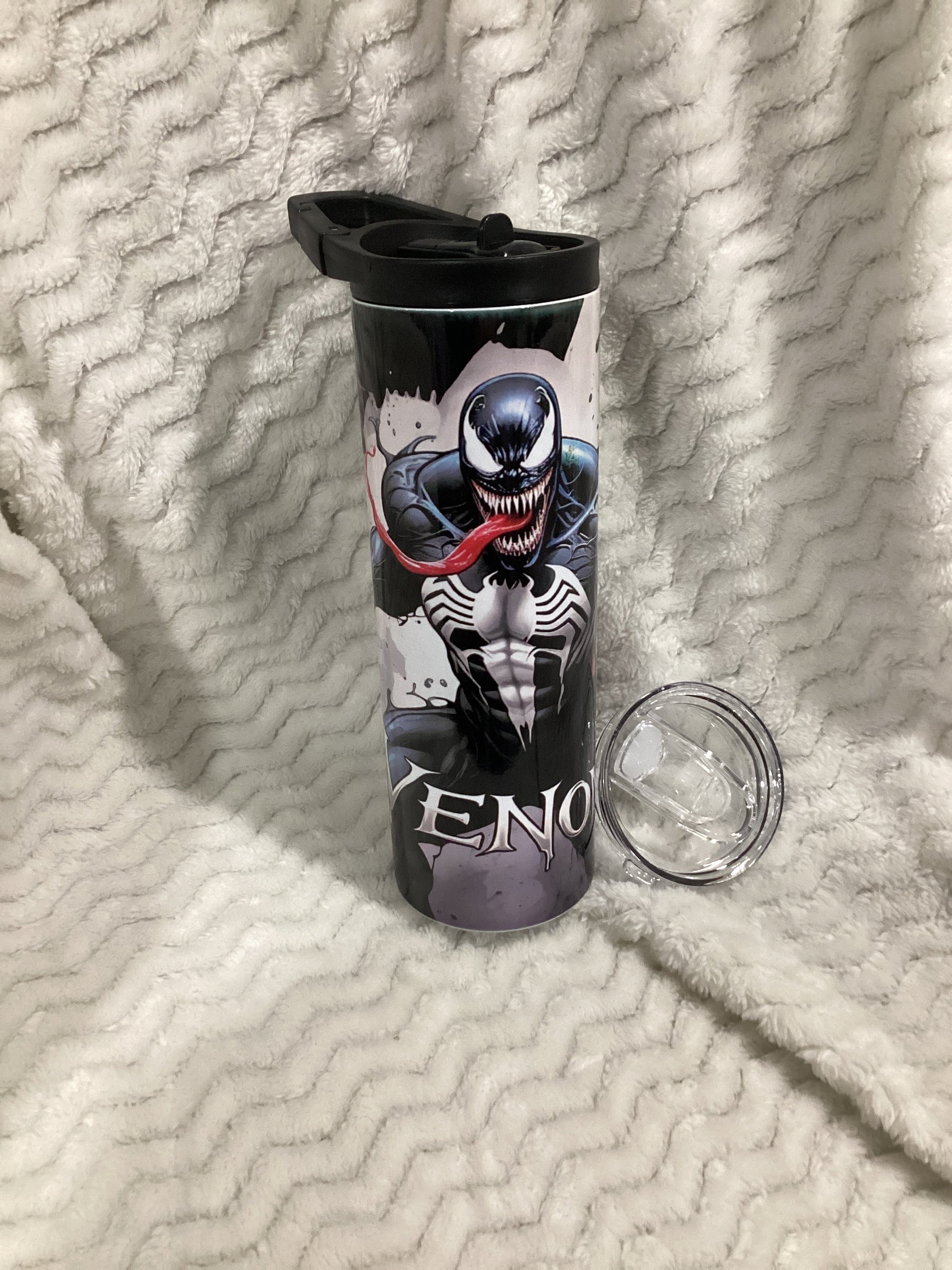 Venom water bottle with extra lid